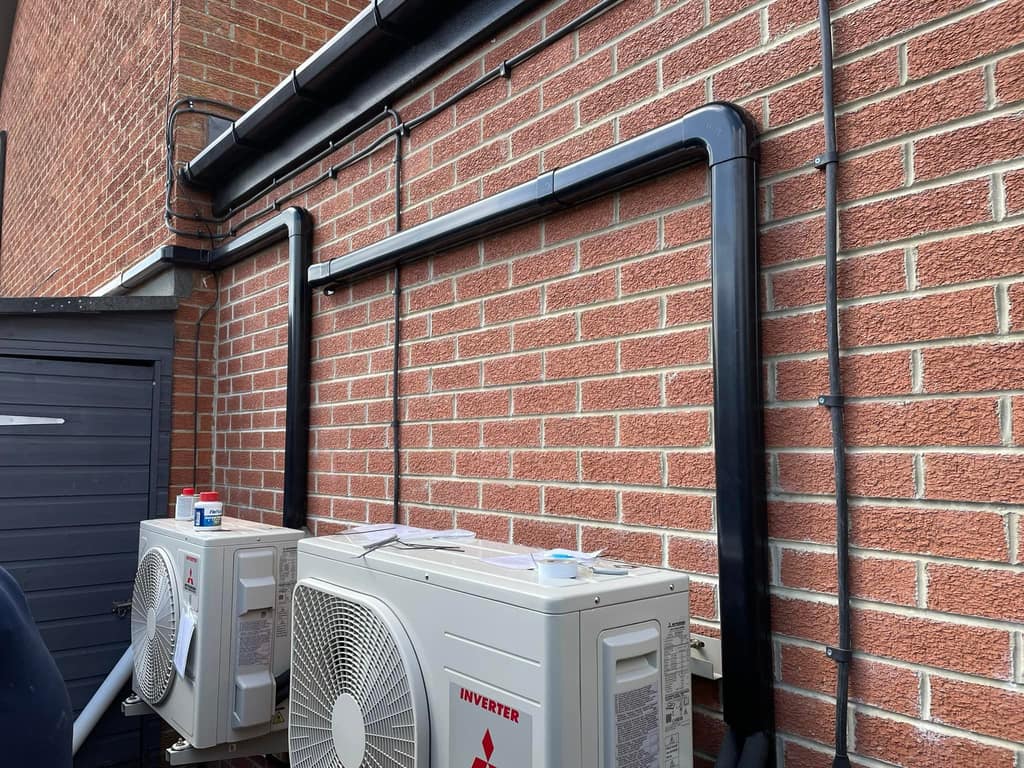 Air conditioning outdoor units on a brick wall, Newcastle Air conditioning outdoor units on a brick wall fitted by UK Aircon, air conditioning installers serving Newcastle
